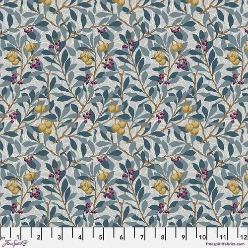 Floral pattern fabric with leaves and berries on a blue background