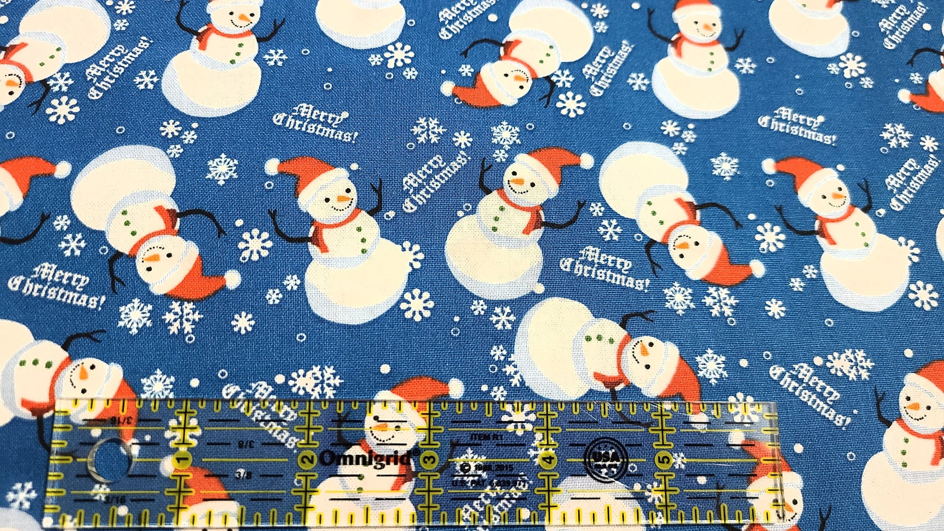 Christmas  fabric Snowman on green and blue 100% cotton