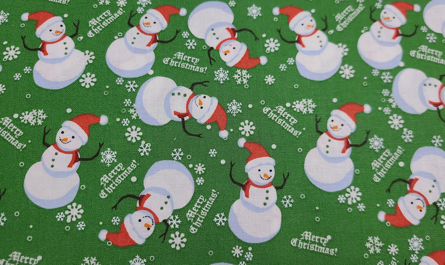 Christmas  fabric Snowman on green and blue 100% cotton