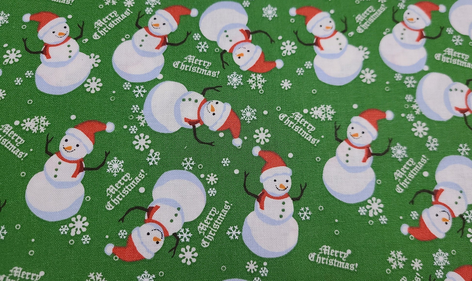 Christmas  fabric Snowman on green and blue 100% cotton