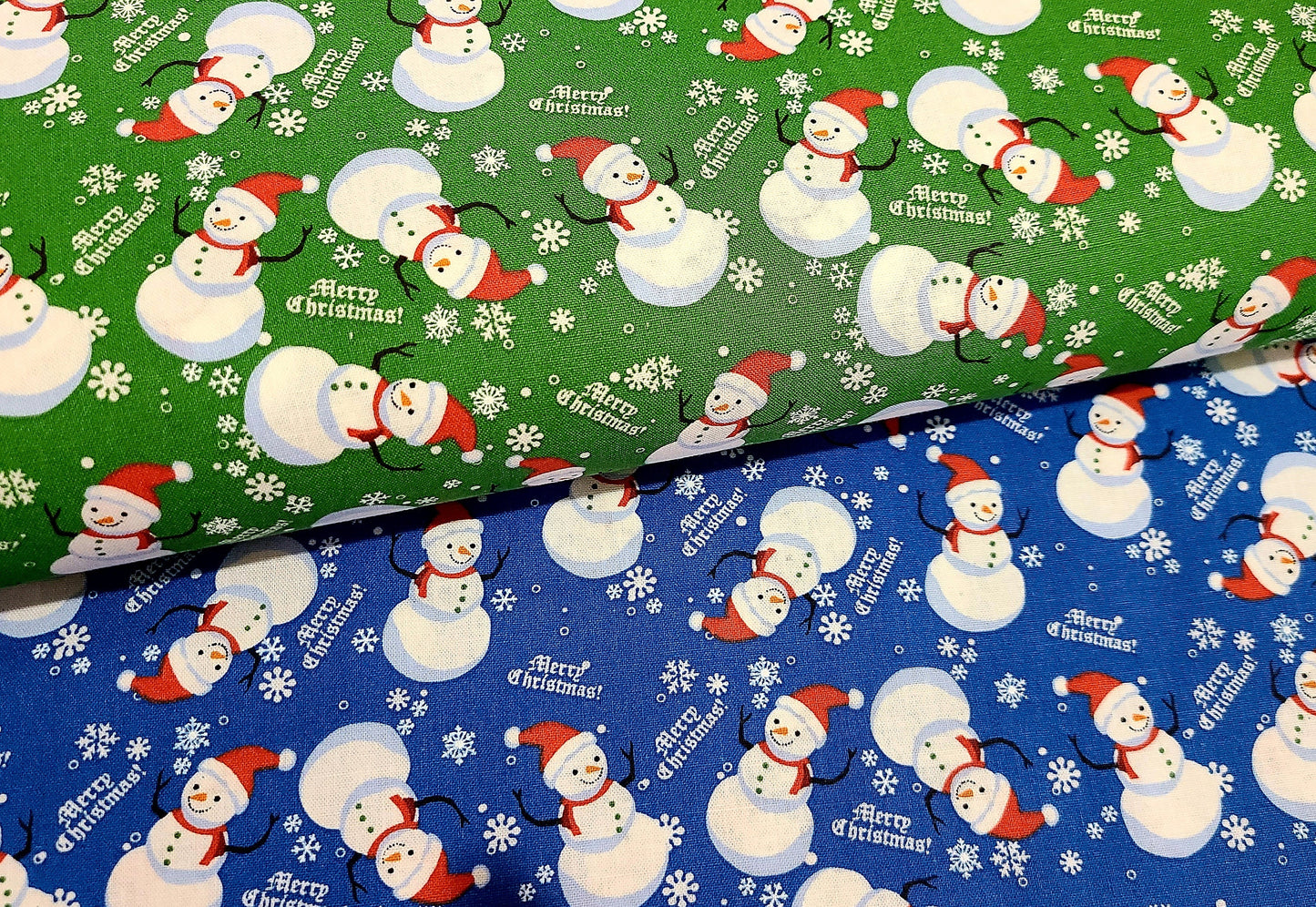 Christmas  fabric Snowman on green and blue 100% cotton