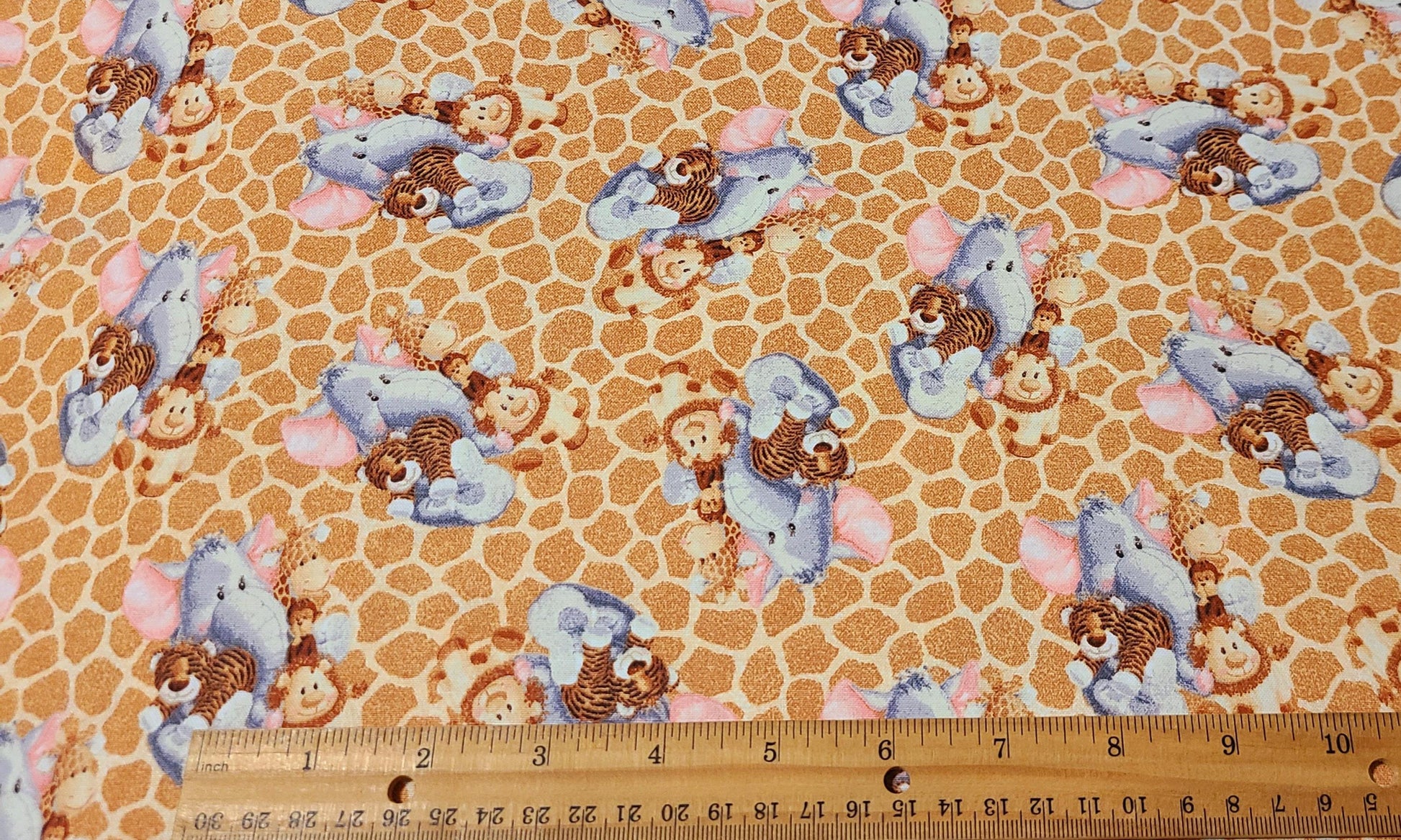 Fabric Traditions Novelty Prints Jungle Babies on Brown Giraffe Print Nursery Cotton Fabric 100% Cotton fabric