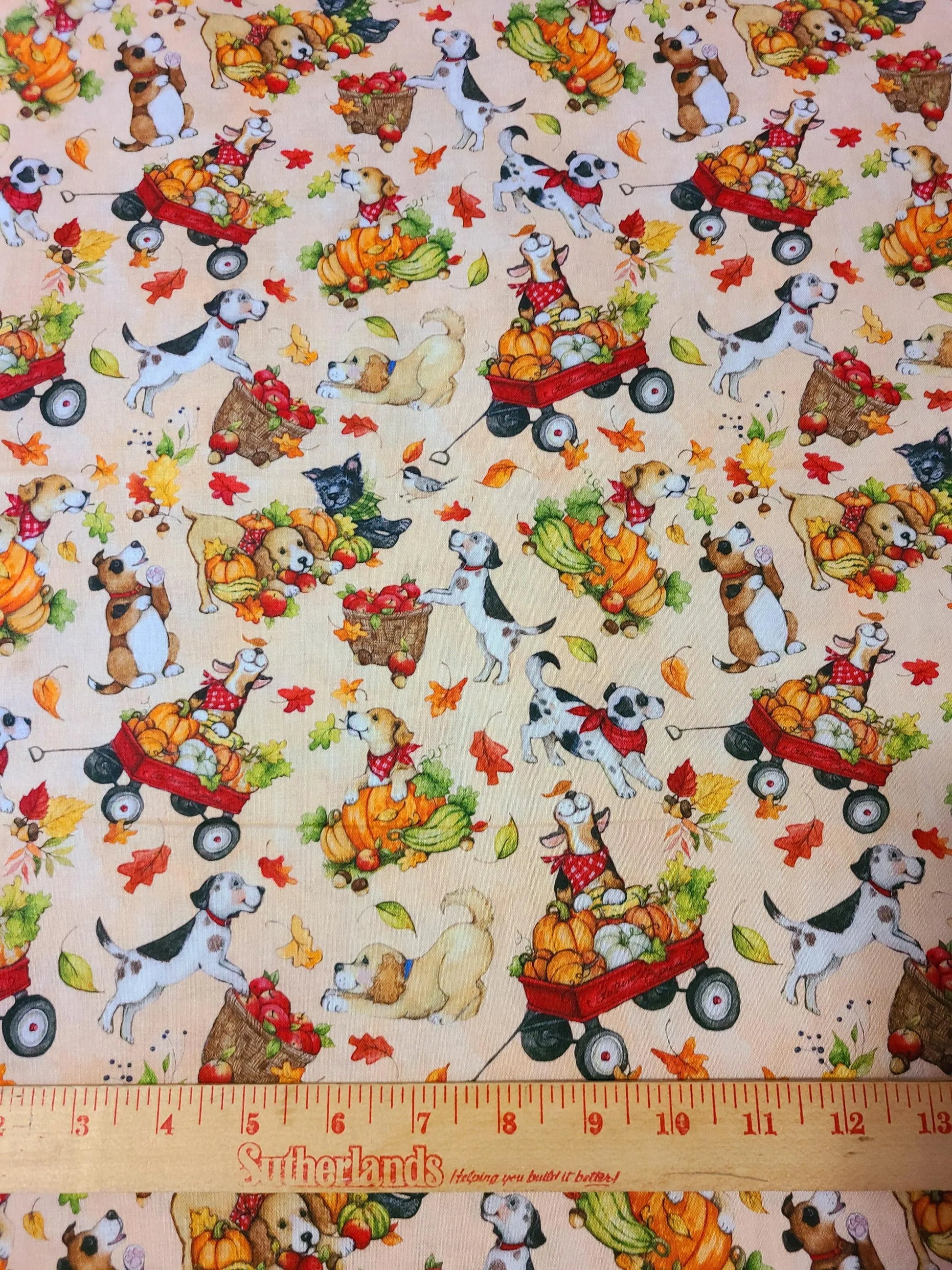 Playful Pups by Susan Winget from Springs Creative fall theme cute puppies pumpkins leaves and wagons 100% cotton fabric