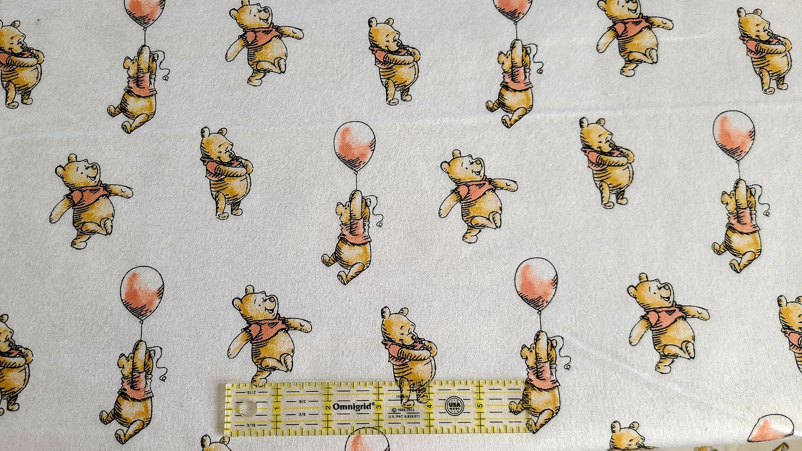 Springs Creative Nursery Flannel Disney Winnie the Pooh Ballon on white flannel Fabric 100% cotton